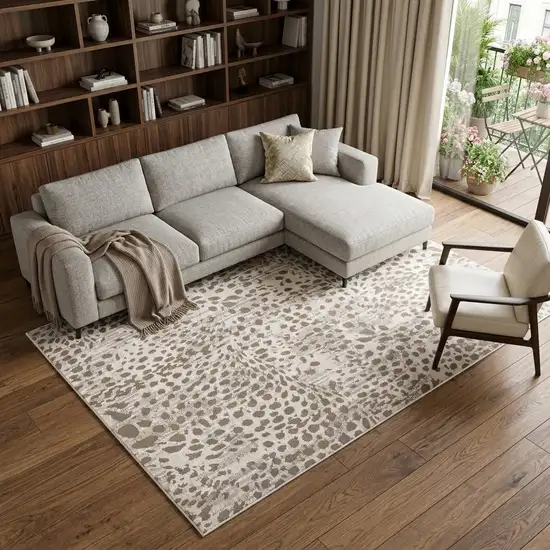 Brown And Ivory Abstract Stain Resistant Area Rug Photo 1