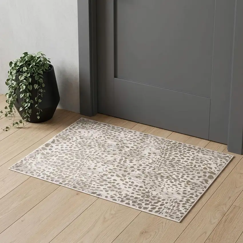 Brown And Ivory Abstract Stain Resistant Area Rug Photo 1