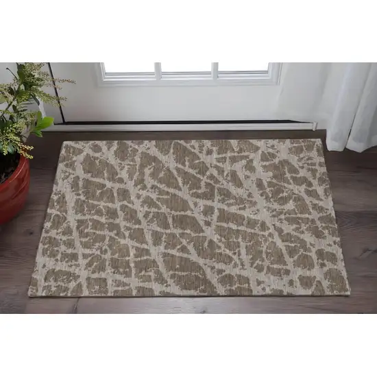 Brown And Ivory Abstract Washable Area Rug With UV Protection Photo 2