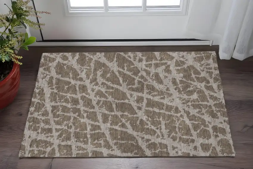 Brown And Ivory Abstract Washable Area Rug With UV Protection Photo 2