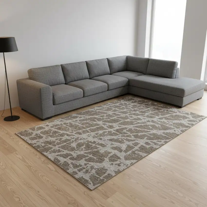 Brown And Ivory Abstract Washable Area Rug With UV Protection Photo 1