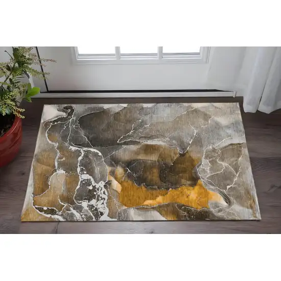Brown And Ivory Abstract Washable Area Rug With UV Protection Photo 2
