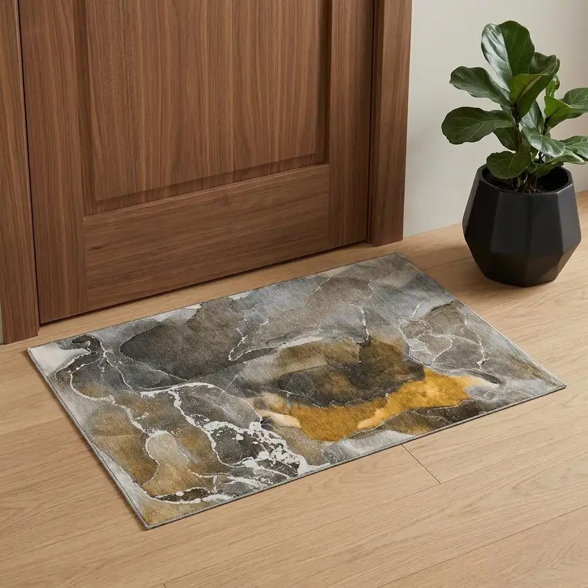 Brown And Ivory Abstract Washable Area Rug With UV Protection Photo 1