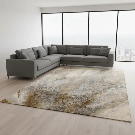 Brown And Ivory Abstract Washable Area Rug With UV Protection Photo 1