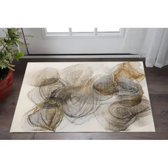 Brown And Ivory Abstract Washable Area Rug With UV Protection Photo 3
