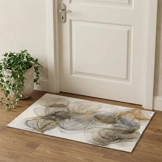 Brown And Ivory Abstract Washable Area Rug With UV Protection Photo 1