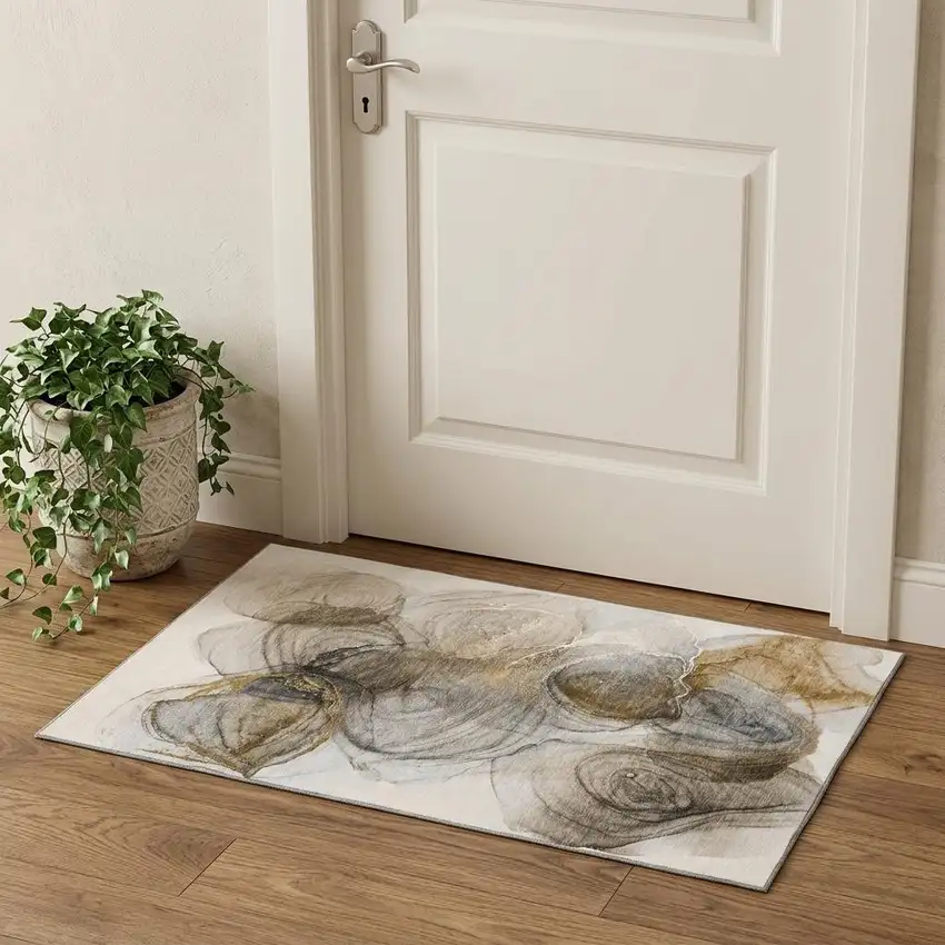Brown And Ivory Abstract Washable Area Rug With UV Protection Photo 1