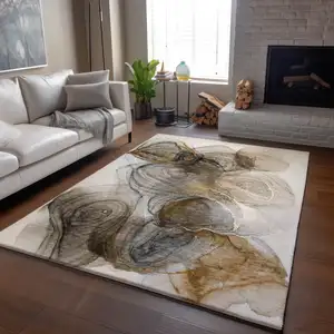 Photo of Brown And Ivory Abstract Washable Area Rug With UV Protection