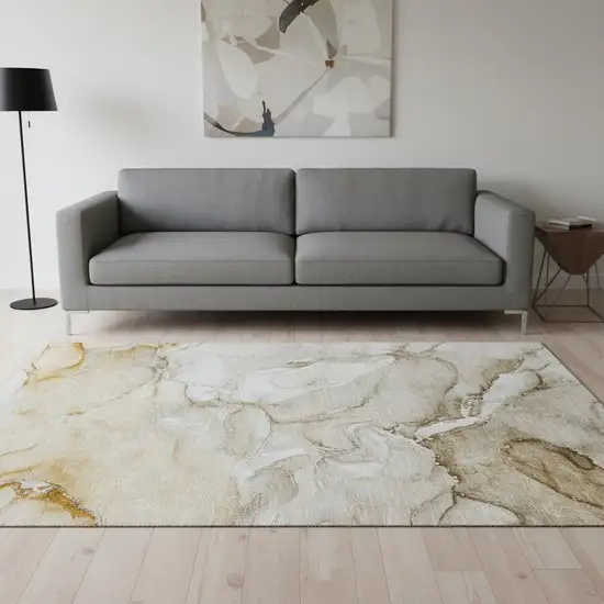 Brown And Ivory Abstract Washable Area Rug With UV Protection Photo 1