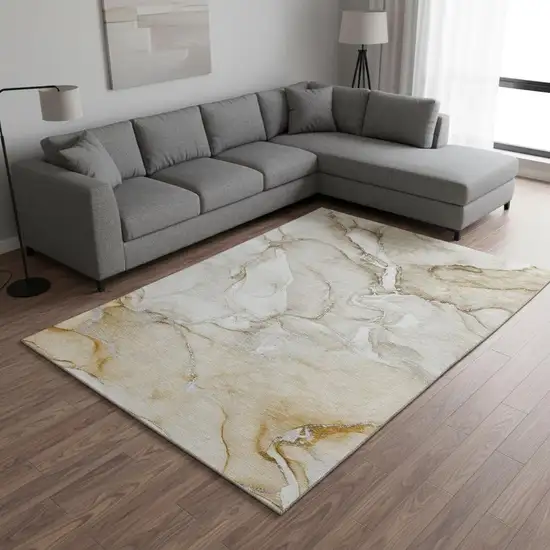 Brown And Ivory Abstract Washable Area Rug With UV Protection Photo 1