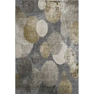 Photo of Brown And Ivory Abstract Washable Area Rug With UV Protection
