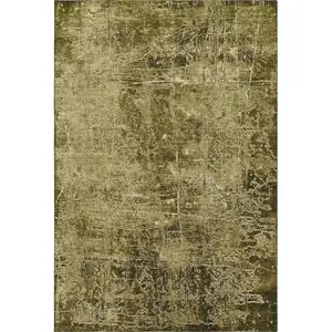 Photo of Brown And Ivory Abstract Washable Area Rug With UV Protection