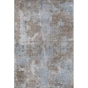 Photo of Brown And Ivory Abstract Washable Area Rug With UV Protection