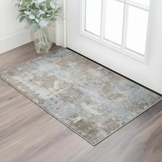 Brown And Ivory Abstract Washable Area Rug With UV Protection Photo 2