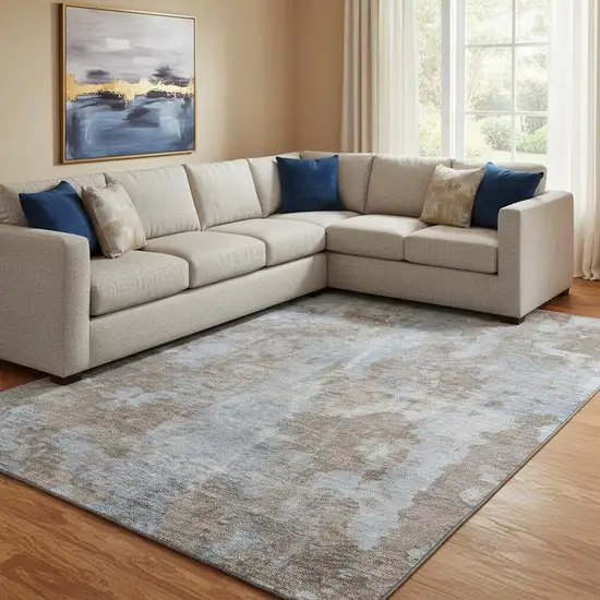 Brown And Ivory Abstract Washable Area Rug With UV Protection Photo 1