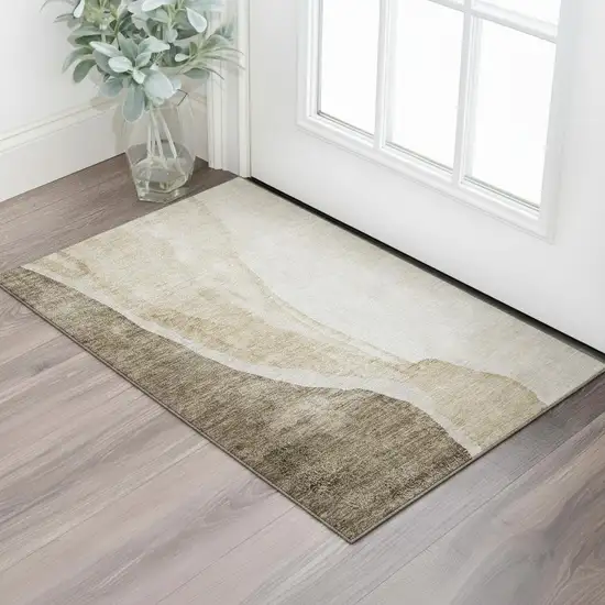 Brown And Ivory Abstract Washable Area Rug With UV Protection Photo 1