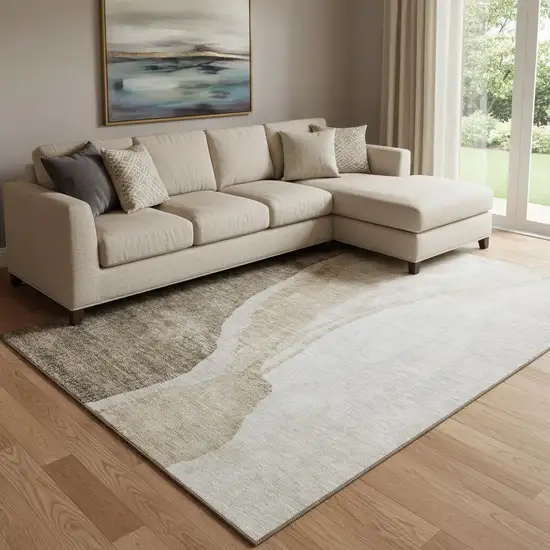 Brown And Ivory Abstract Washable Area Rug With UV Protection Photo 1