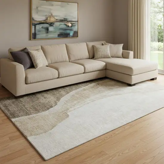 Brown And Ivory Abstract Washable Area Rug With UV Protection Photo 1