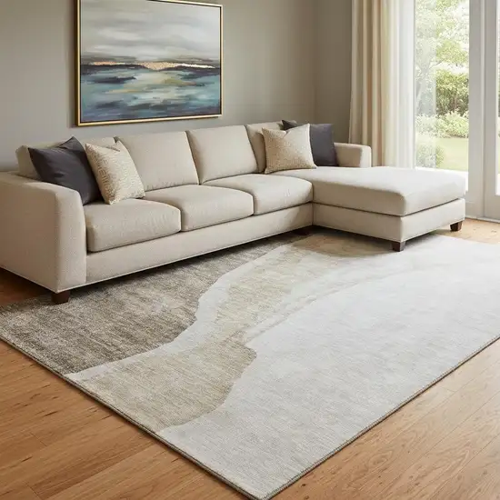 Brown And Ivory Abstract Washable Area Rug With UV Protection Photo 1