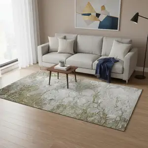 Photo of Brown And Ivory Abstract Washable Area Rug With UV Protection