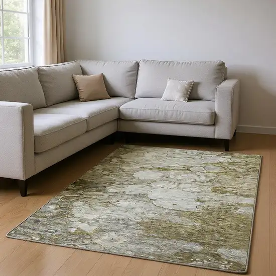 Brown And Ivory Abstract Washable Area Rug With UV Protection Photo 1