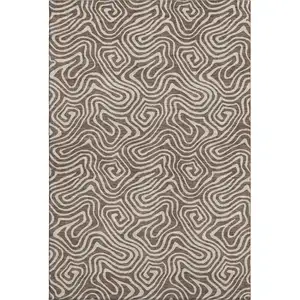 Photo of Brown And Ivory Abstract Washable Area Rug With UV Protection