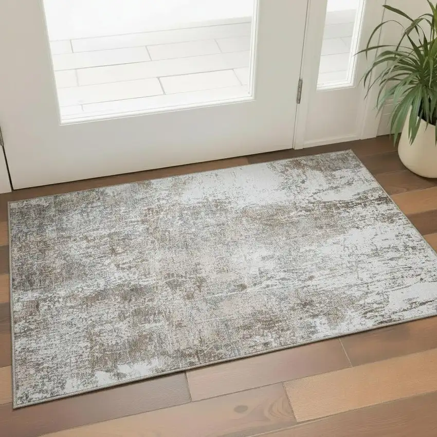 Brown And Ivory Abstract Washable Area Rug With UV Protection Photo 2