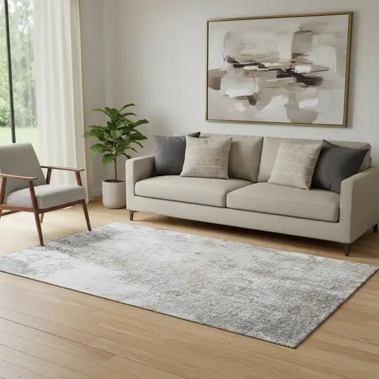 Brown And Ivory Abstract Washable Area Rug With UV Protection Photo 2