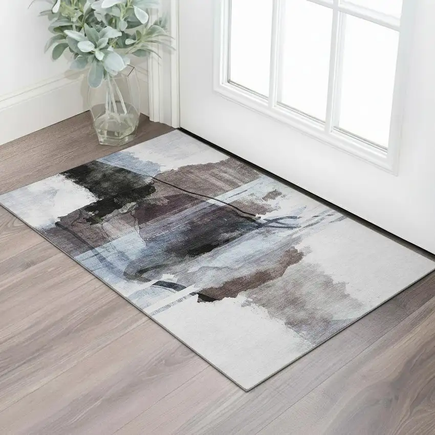Brown And Ivory Abstract Washable Area Rug With UV Protection Photo 2