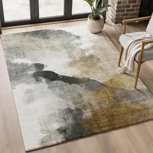 Photo of Brown And Ivory Abstract Washable Area Rug With UV Protection