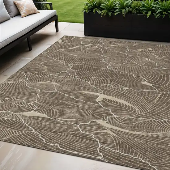 Brown And Ivory Abstract Washable Indoor Outdoor Area Rug Photo 1