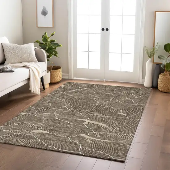 Brown And Ivory Abstract Washable Indoor Outdoor Area Rug Photo 9