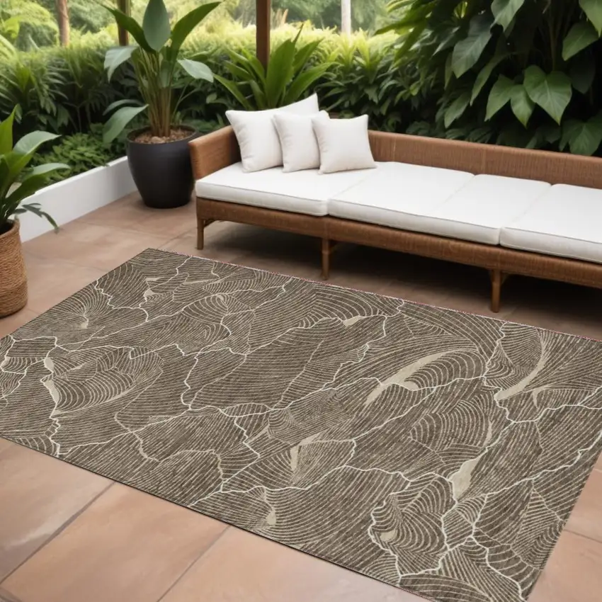 Brown And Ivory Abstract Washable Indoor Outdoor Area Rug Photo 1