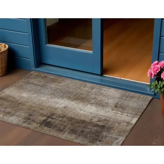 Brown And Ivory Abstract Washable Indoor Outdoor Area Rug Photo 2