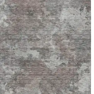 Photo of Brown And Ivory Abstract Washable Indoor Outdoor Area Rug