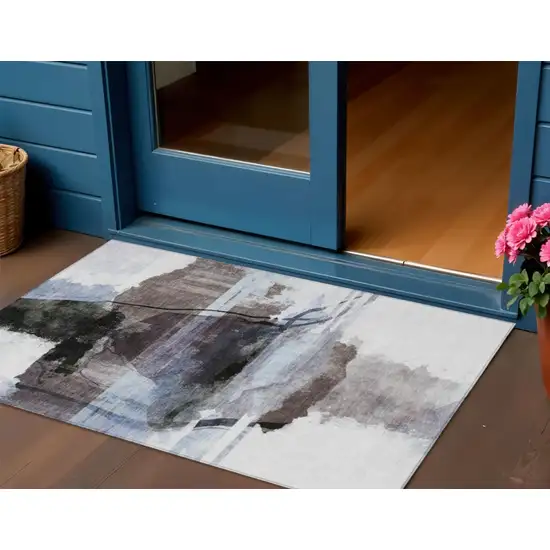 Brown And Ivory Abstract Washable Indoor Outdoor Area Rug Photo 2