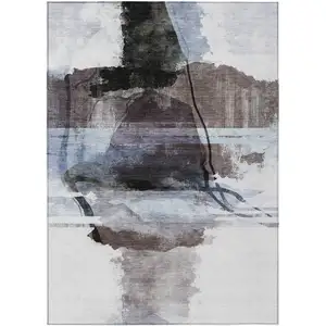 Photo of Brown And Ivory Abstract Washable Indoor Outdoor Area Rug