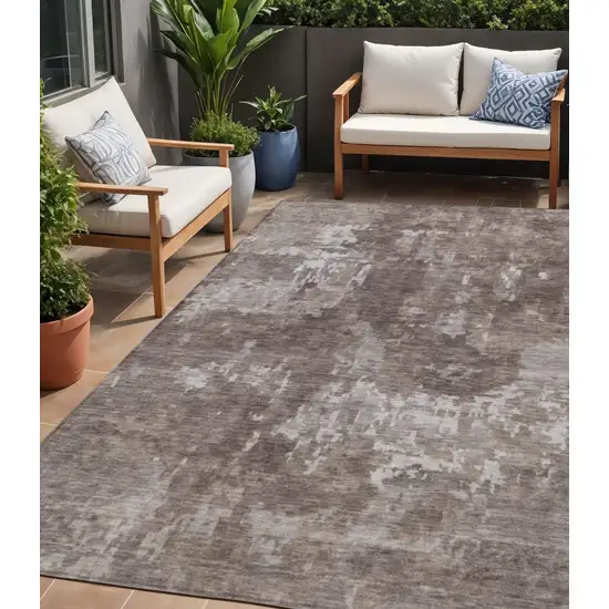 Brown And Ivory Abstract Washable Indoor Outdoor Area Rug Photo 1