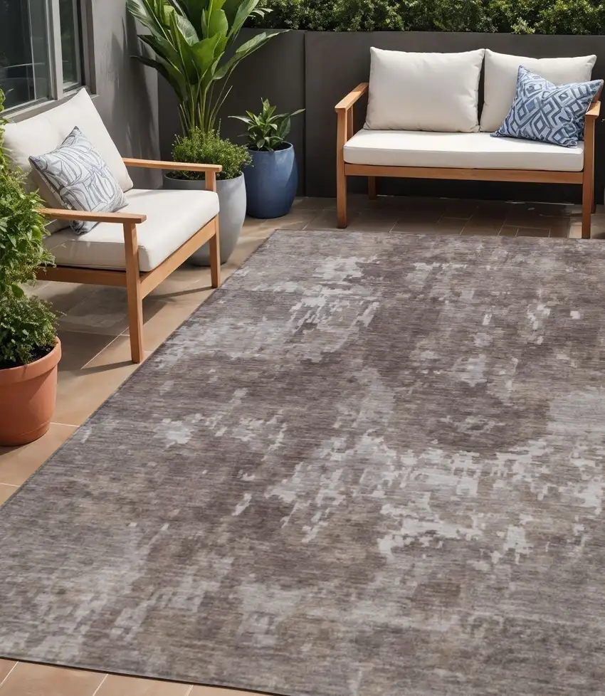 Brown And Ivory Abstract Washable Indoor Outdoor Area Rug Photo 1