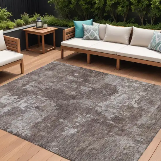 Brown And Ivory Abstract Washable Indoor Outdoor Area Rug Photo 1
