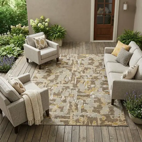Brown And Ivory Abstract Washable Indoor Outdoor Area Rug Photo 1