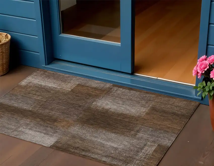 Brown And Ivory Abstract Washable Indoor Outdoor Area Rug Photo 1