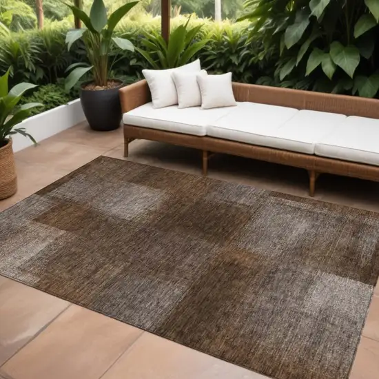Brown And Ivory Abstract Washable Indoor Outdoor Area Rug Photo 1