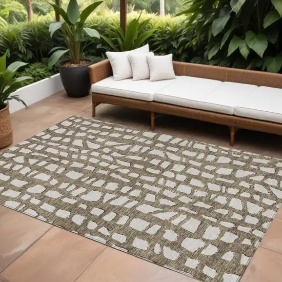 Brown And Ivory Abstract Washable Indoor Outdoor Area Rug Photo 1
