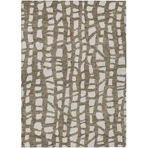 Photo of Brown And Ivory Abstract Washable Indoor Outdoor Area Rug