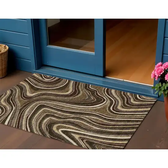 Brown And Ivory Abstract Washable Indoor Outdoor Area Rug Photo 1