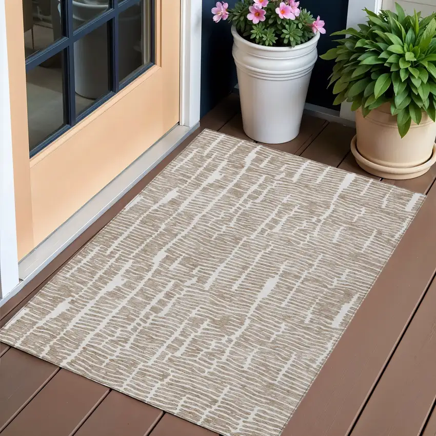 Brown And Ivory Abstract Washable Indoor Outdoor Area Rug Photo 1