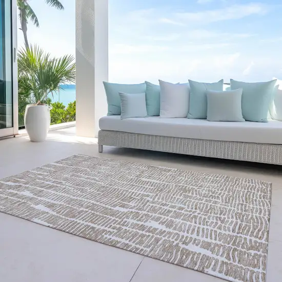 Brown And Ivory Abstract Washable Indoor Outdoor Area Rug Photo 8