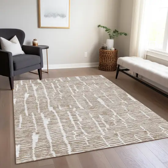 Brown And Ivory Abstract Washable Indoor Outdoor Area Rug Photo 9