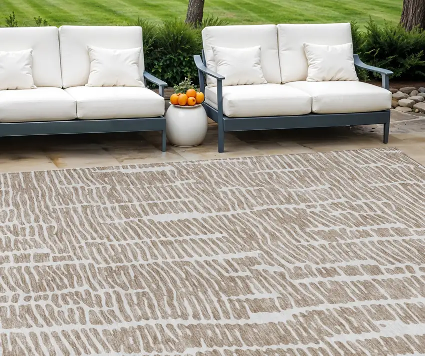 Brown And Ivory Abstract Washable Indoor Outdoor Area Rug Photo 1